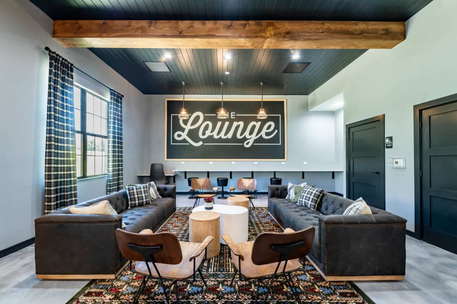 Full view of the lounge at Campus West student apartments in Tallahassee